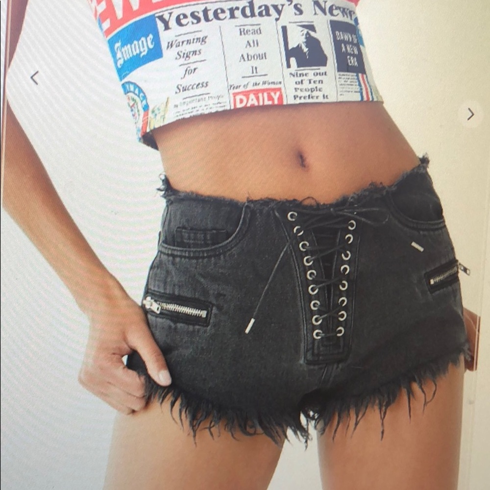 Frayed lace up denim shorts